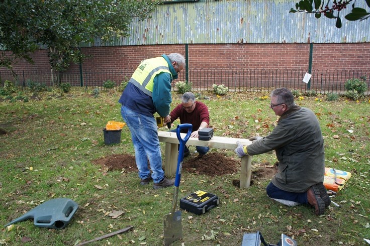 Friends of Sandall Park at work putting in a bench